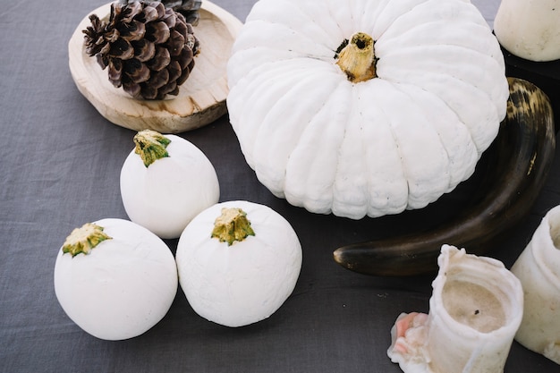 Decoration with white painted pumpkins