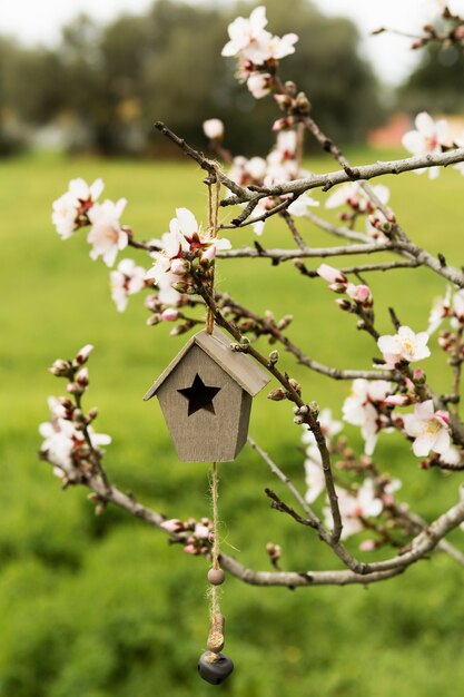 Decoration with wooden house in a tree