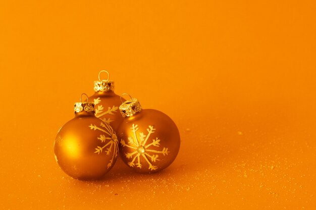 Decorative balls on orange background