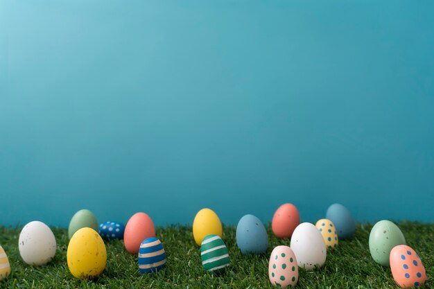Decorative colored eggs on grass for easter day