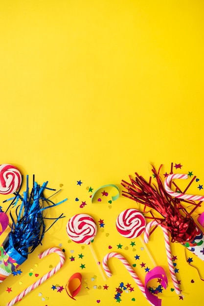 Decorative composition with candy canes and lollipops