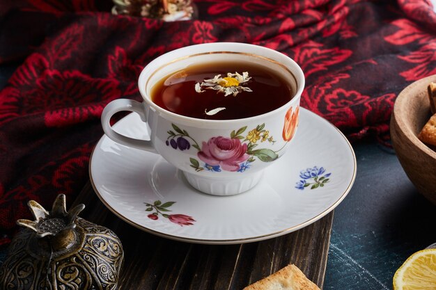 A decorative cup of herbal tea. 