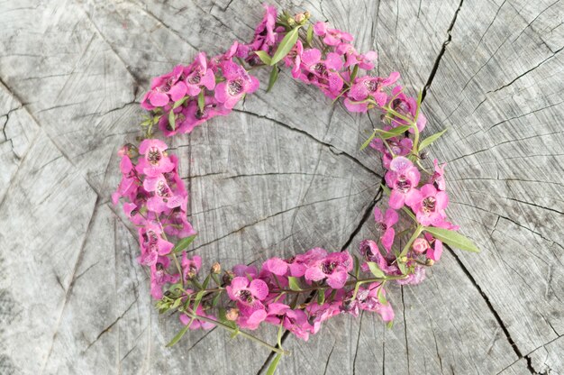 Decorative floral wreath on stump