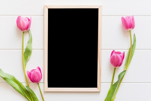 Decorative flowers with a blackboard