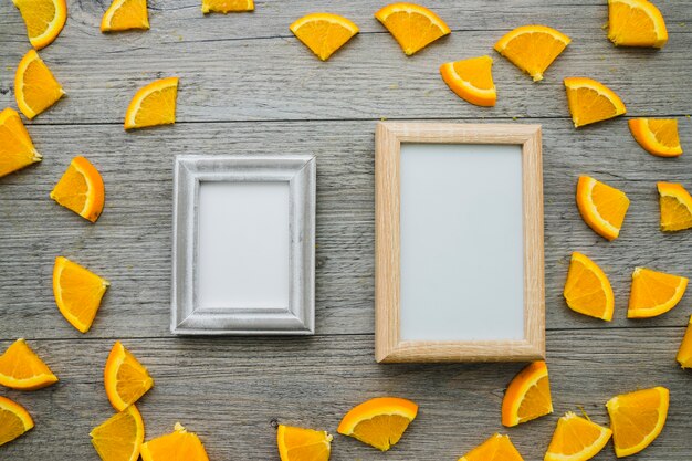 Decorative frames surrounded by orange pieces