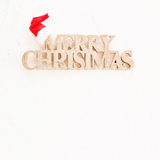 Decorative merry Christmas inscription with party hat