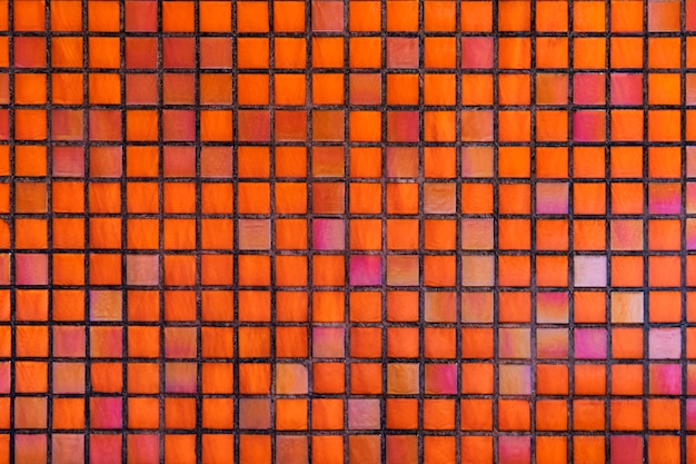 Foto gratuita fondo strutturato del mosaico arancio decorativo