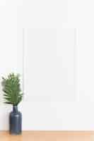 Free photo decorative plant with empty frame