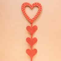 Free photo decorative red hearts on stick