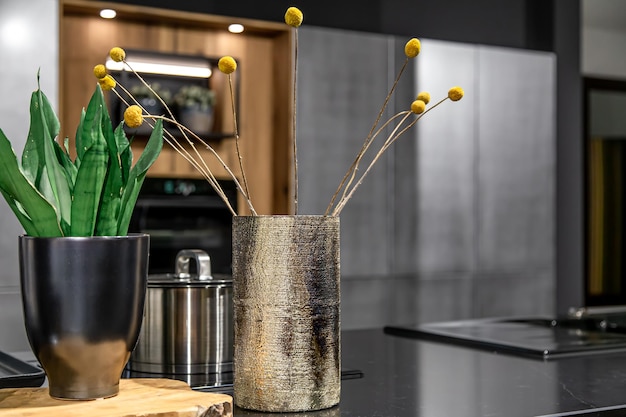 Decorative shiny vase in the interior of a modern kitchen