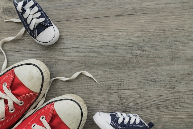 Decorative shoes on wooden surface for father's day