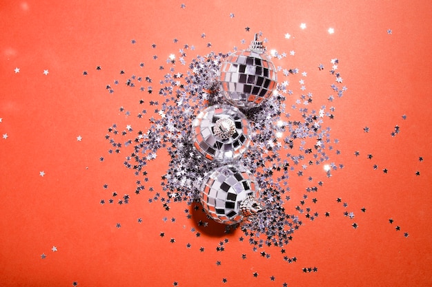 Decorative silver baubles near ornament stars