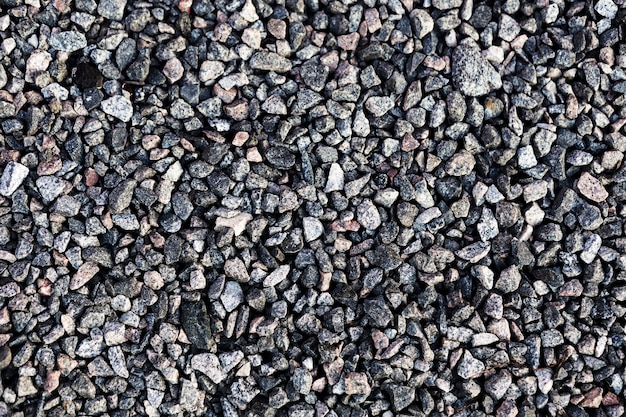 Free photo decorative uneven cracked gravel wall surface