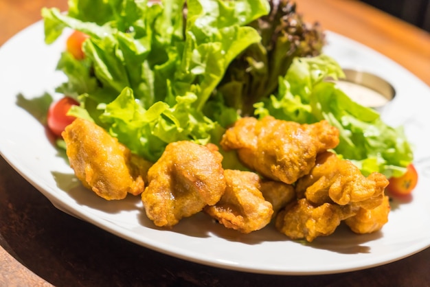 Free photo deep fried chicken  with salad