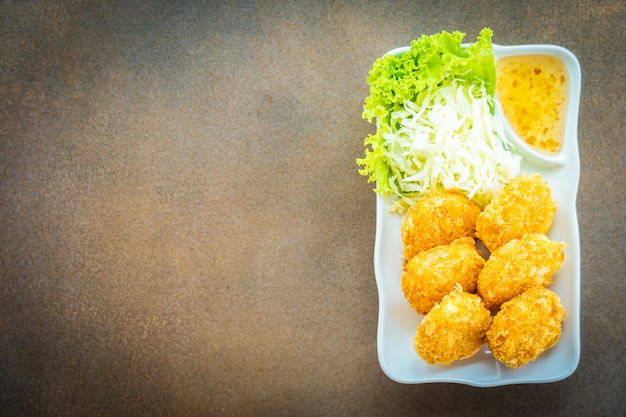 Deep fried shrimp cake or ball with vegetable