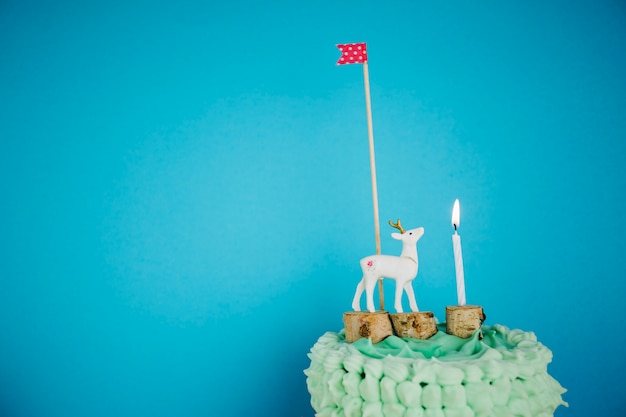 Free photo deer, flag and candle on cake