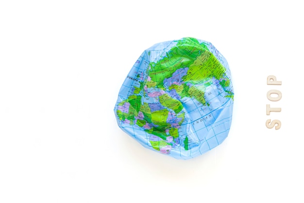 Deflated Earth ball and stop word