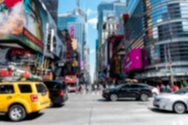 Defocused busy city street in daylight