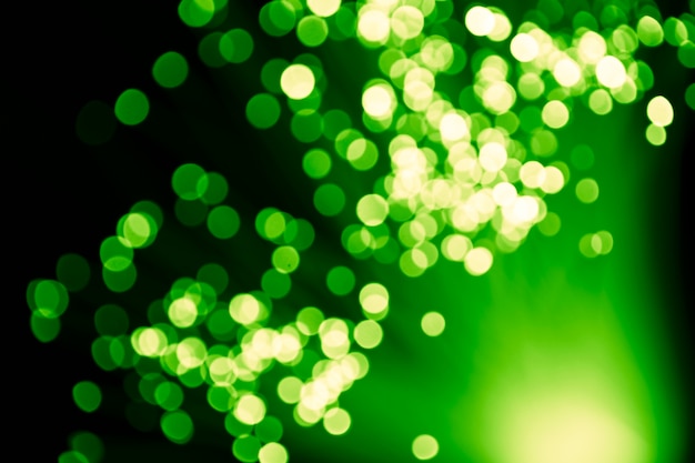 Free photo defocused green lights optical fiber