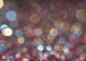 Free photo defocused multicolored glitter