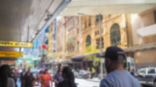 Defocused photo of a street with people