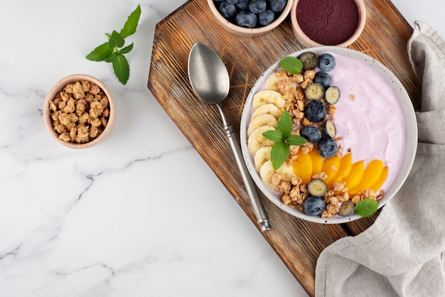 Free photo delicious açai bowl arrangement with copy space