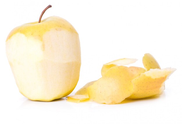 delicious apple on a plate over a wooden table