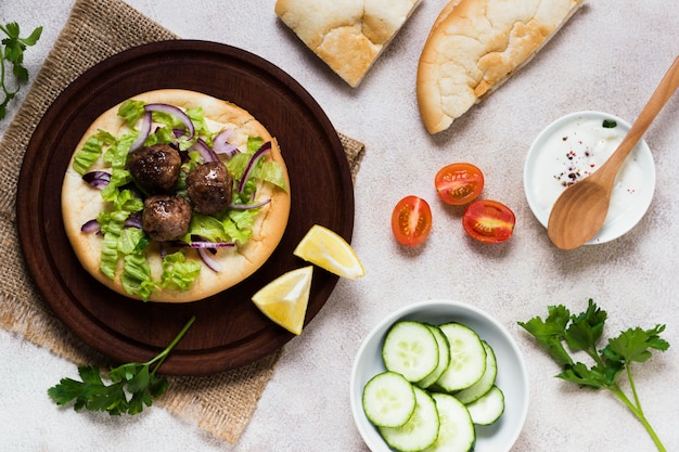 Delicious arabic fast-food meat rolls and veggies