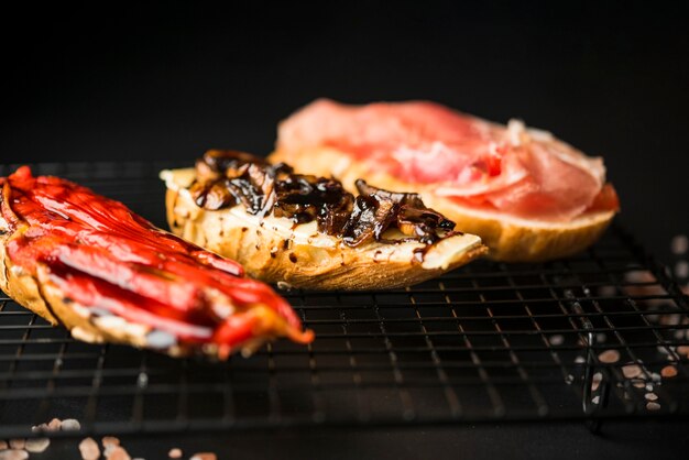 Delicious assortment of bruschetta close up