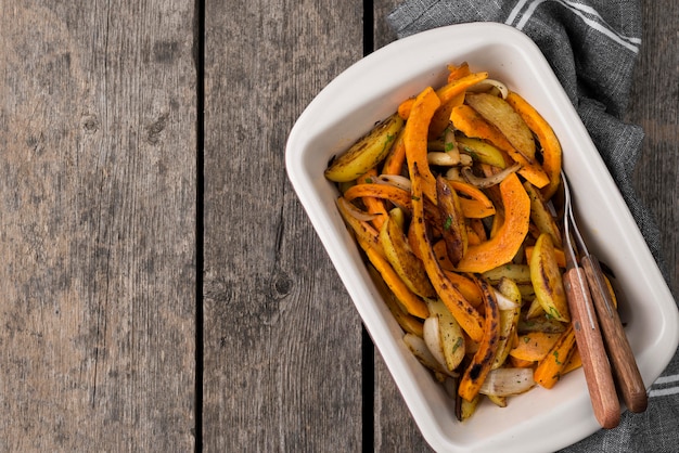 Delicious autumn food composition on wooden background