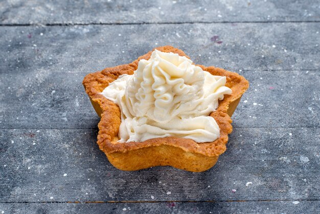 delicious baked cake star shaped with white yummy cream inside on light desk, cake bake sugar sweet cream tea