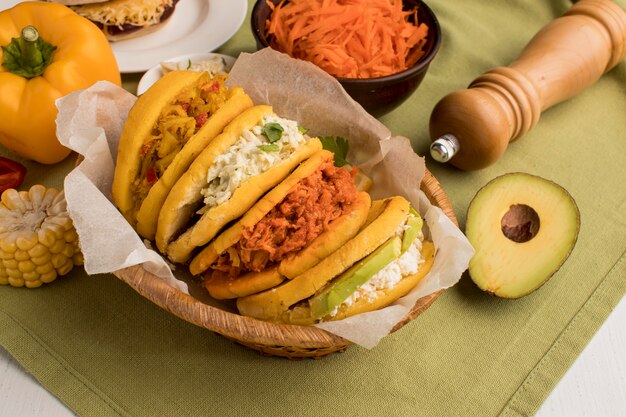 Delicious basket with arepas