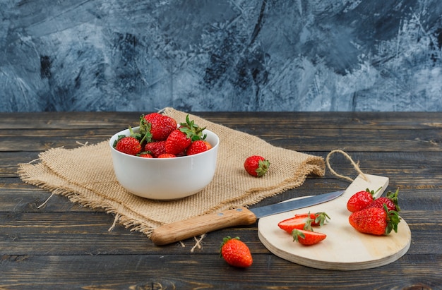 Delicious berries on the wooden table