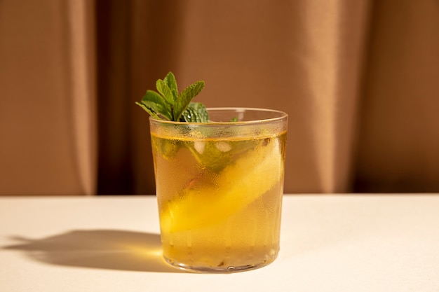 Free photo delicious beverage garnish with mint leaf