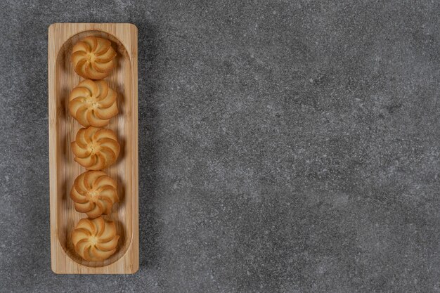 Delicious biscuit on the tray  on the marble surface