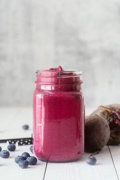 Delicious blueberry beverage in jar mug