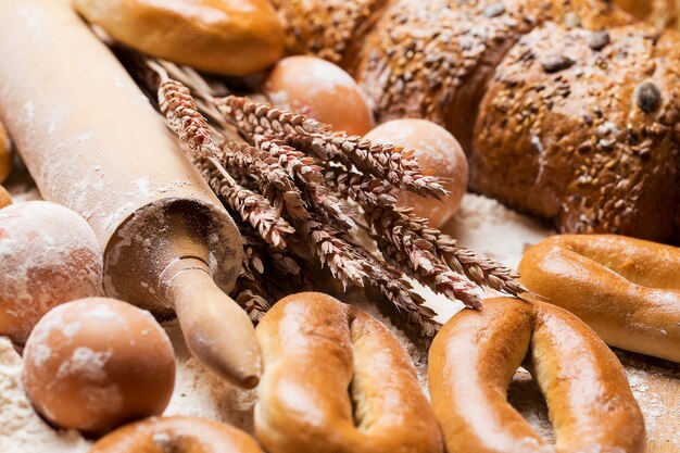 Delicious bread, bagels and eggs on the table