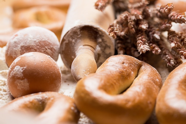 Delicious bread, bagels and eggs on the table