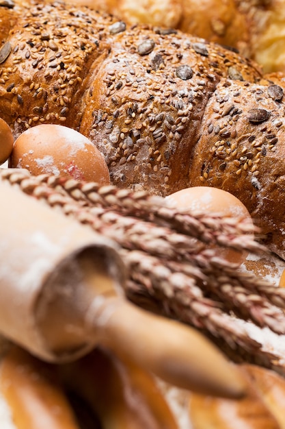 Delicious bread, bagels and eggs on the table