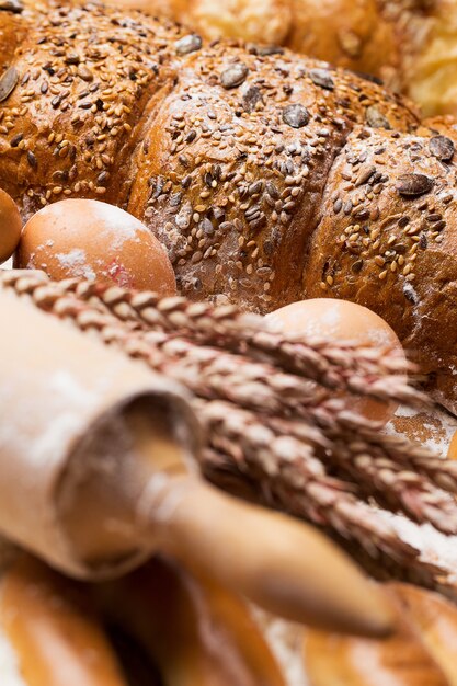 Delicious bread, bagels and eggs on the table