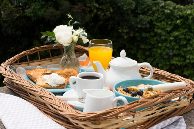 Delicious breakfast tray in the garden