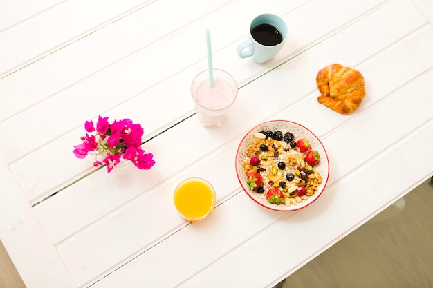 Delicious breakfast on white table