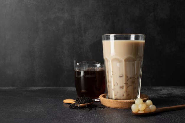 Delicious bubble tea drink on table