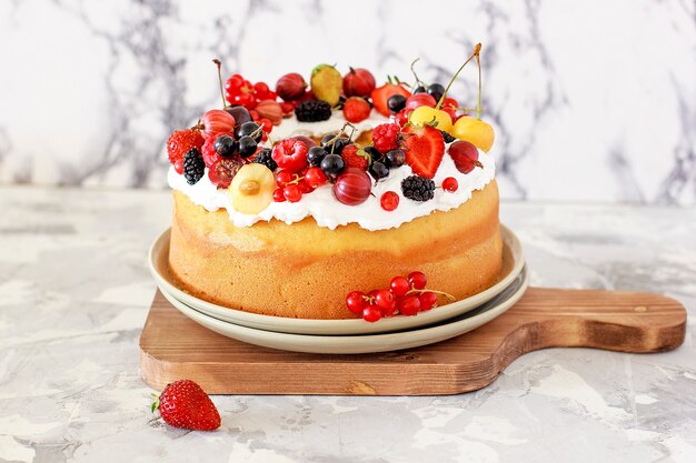 Delicious bundt cake with berries close-up