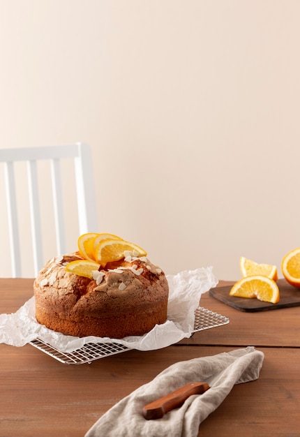 Delicious bundt cake with oranges arrangement