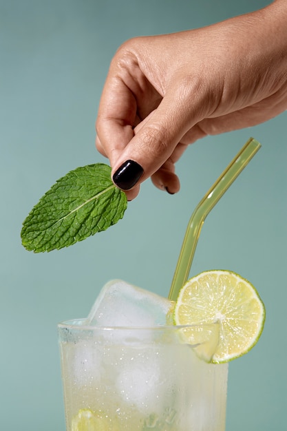 Delicious caipirinha cocktail with lime and mint