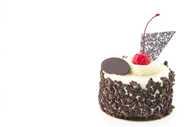 Delicious cake with chocolate and a cherry