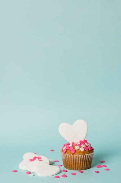 Delicious cake with decorative hearts