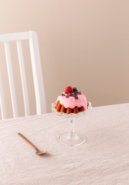 Delicious cake with forest fruits arrangement