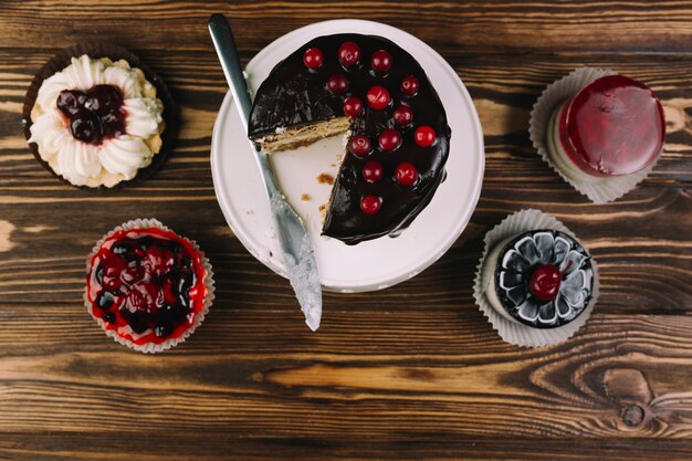 Delicious cakes on lumber tabletop